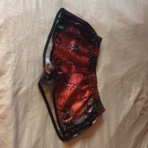 Red snakeskin small Adidas shorts. Like new.